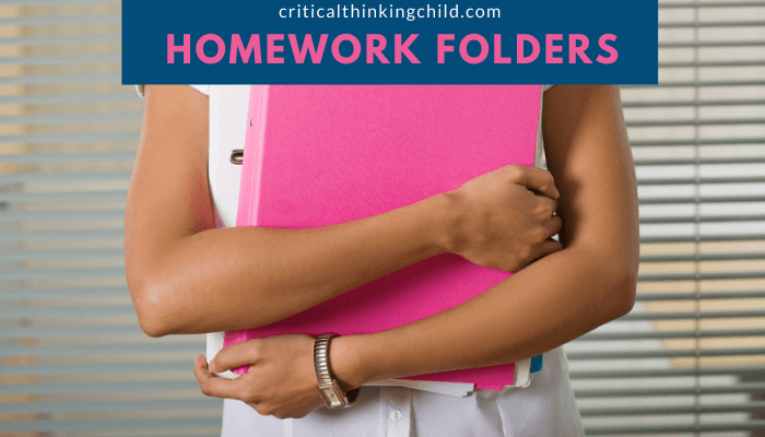 woman holding pink folders 